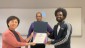 ITI Program Director Sue Kim, Prof. Carl Burnett - Yitbarek Kebebe
